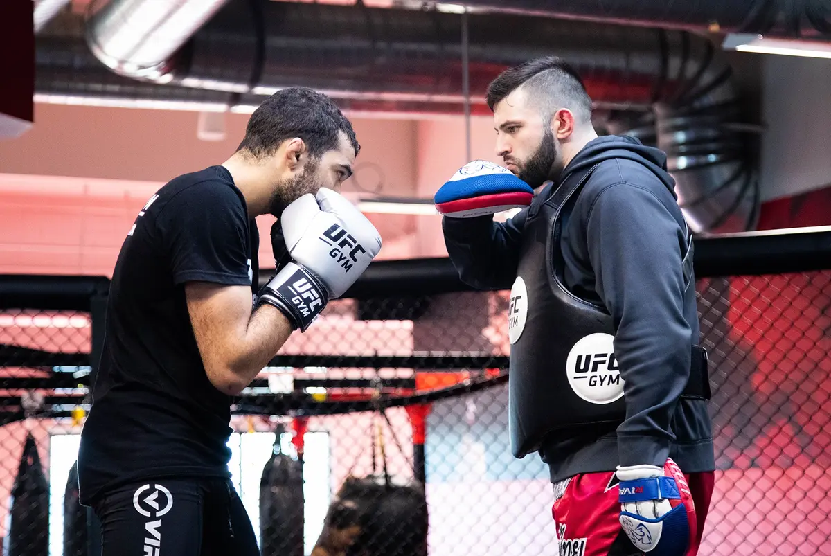 Members getting coaching from trainer